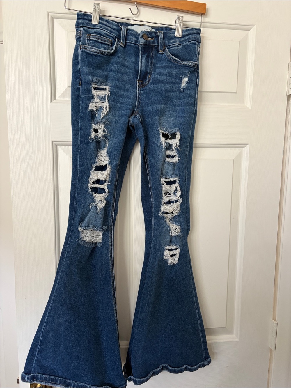 Distressed Dark Blue Flare Jeans with Ripped Detail